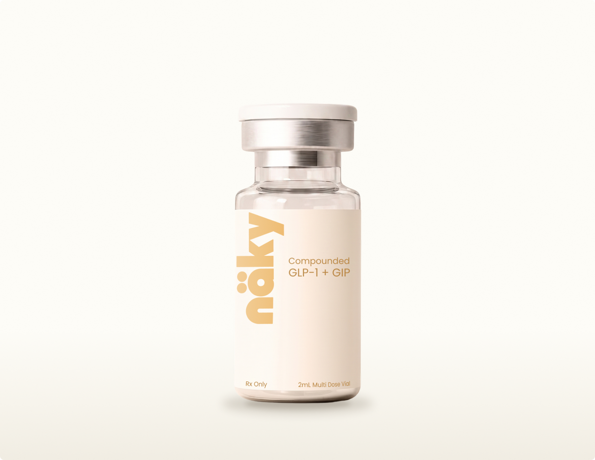 Compounded tirzepatide multi-dose vial on a warm neutral background